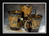 C037.  Wheel thrown mugs, glaze series O.