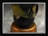 Glaze App D.  D. Matte Black (O) (SG146); Root Beer (K) (SG145) 1/2; Hazelnut (F) (SG142) Splotch; Float Blue (C) (SG152) Dots.		