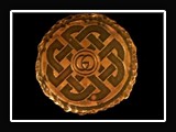 M004.  Hammered copper plate etched with celtic design.