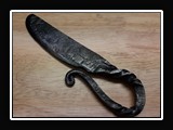 M008.  Forged iron butter knife.