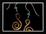 M011.  Hammered copper earrings.