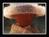T002.  Handknitted wool hat with matching handspun/handwoven wool scarf.
